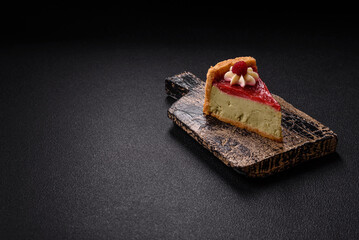 Delicious sweet dessert cheesecake with raspberry and pistachio flavor