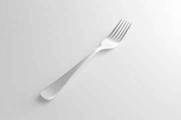 A Single Silver Fork on a White Background