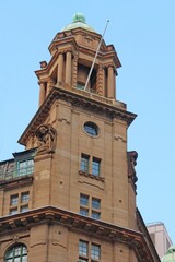 Tower on a sandstone commercial building