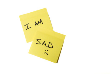 I Am Sad sticky note on white background