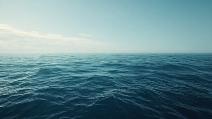 Obraz premium A vast expanse of calm blue ocean with a cloudy sky above