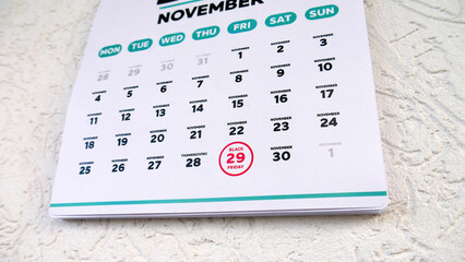 Close-up of Black Friday date 2024 on a wall calendar page