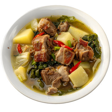 Classic filipino pork sinigang soup with juicy pork, crisp veggies, and potatoes in a zesty broth, presented in a clean white bowl