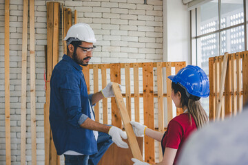 Carpenter working in carpentry shop. Carpenter working to making wood furniture in wood workshop