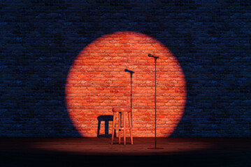 Empty stand-up stage with a microphone and spotlights. An empty stage with bricks on background