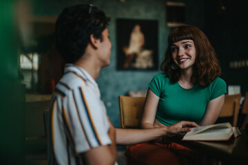A young couple sits in a cozy cafe, engaging in a warm and friendly conversation. The atmosphere is intimate, with soft lighting and comfortable seating.