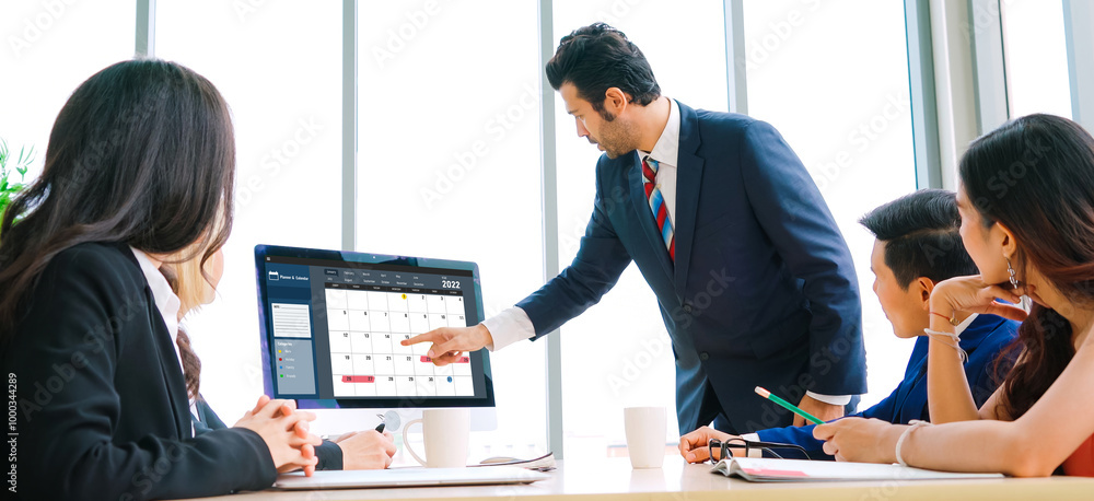 Poster calendar on computer software application for modish schedule planning for personal organizer and on