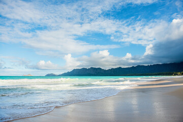 Sandy beach with mountain views on Oahu, Hawaii