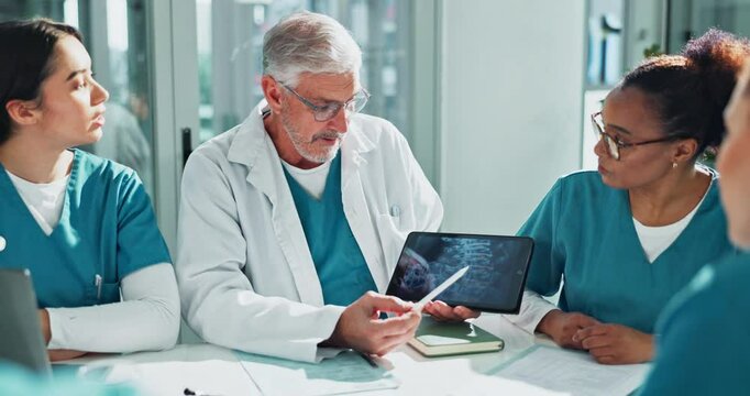 Medical, team and tablet in office for presentation, patient xray and mature professor with people for conversation. Teaching, hospital staff and nurse together with tech, discussing and diagnosis - Powered by Adobe
