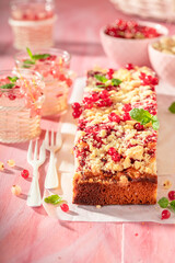 Hot red currant yeast cake with glaze and crumble.