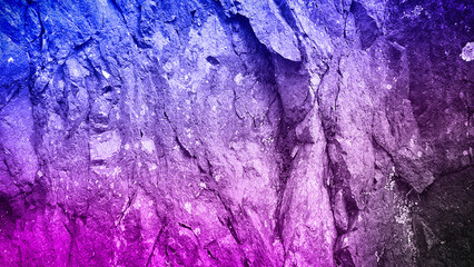 A vibrant gradient with soft transitions from blue to purple and pink, overlaid on a natural stone texture. Perfect for creative backgrounds, wallpapers, and digital art