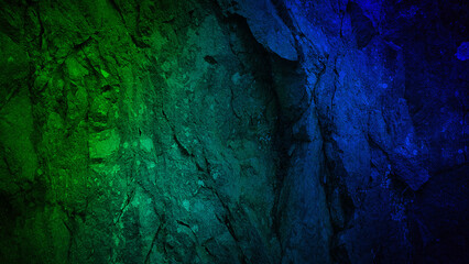 An abstract gradient with smooth transitions from green to blue over a rugged stone texture, perfect for creating vibrant backgrounds, wallpapers, and digital art