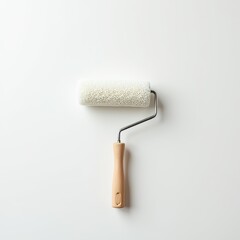 Obraz premium A paint roller with a metal handle, used for applying color to walls during home improvement and decorating projects
