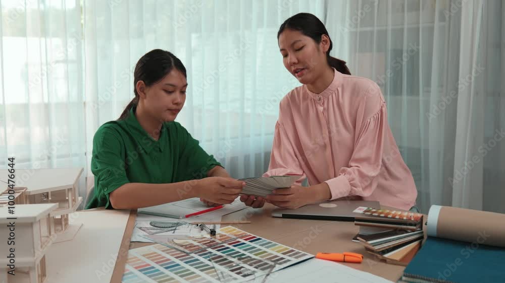 Poster slow motion interior designer using architectural equipment draw a blueprint while interior designer