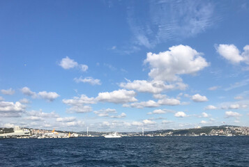 Fototapeta premium Bosphorus at cloudy day behind July 15 Martyrs Bridge (Bosphorus Bridge) in Istanbul, Turkey.