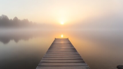 Serene Sunrise Over Foggy Lake