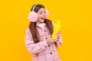 Excitement in a bottle. Excited girl hold plastic bottle. Beverage product. Bottled beverage