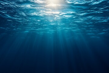Sunlight Beams Through Deep Blue Ocean