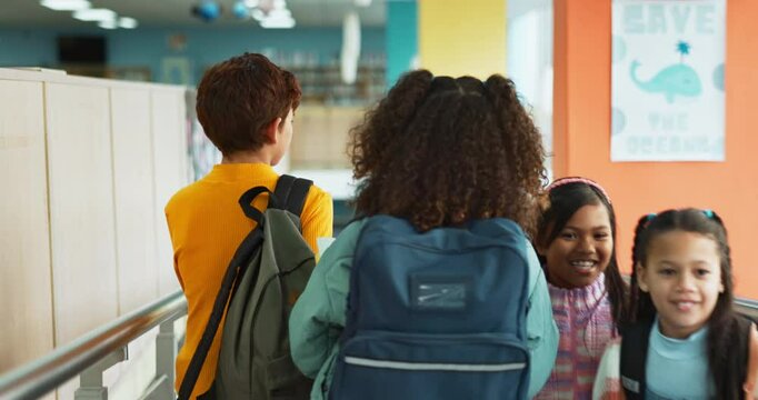 Back, children and friends with walking, hallway and positive in together, campus or academy. Students, kids group and corridor for education, development and scholarship in learning, class or school