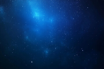 Fototapeta premium Dark blue night sky with glowing stars, a starry backdrop representing the universe and space, capturing the beauty of a blue, glowing expanse in a serene night scene.