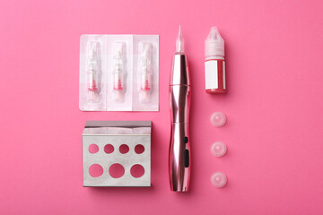 Permanent makeup equipment kit on pink background, flat lay