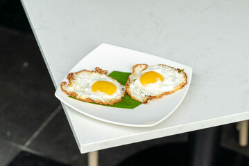 Two Fried Egg Over Medium: Perfectly Cooked Breakfast Delight for a Hotel Experience