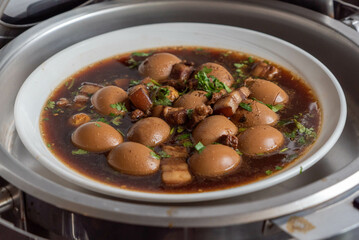 Kai Pa Low - Stewed Pork with Eggs: A Traditional Thai Breakfast Dish Featuring Tender Pork and Flavorful Eggs