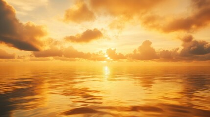 Obraz premium Golden sky at sunrise with soft clouds and reflections on the ocean, creating a serene and picturesque scene