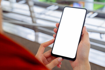 Hand holding smartphone mockup of blank screen, Take your screen to put on advertising.