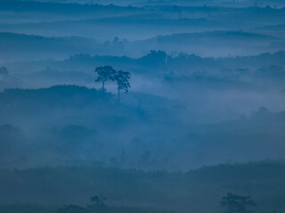 Landscape of beautiful morning fog sunrise at Khao Na Nai Luang Dharma Park in Surat Thani province, Thailand
