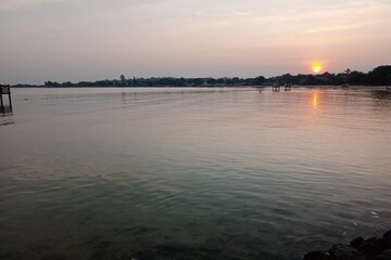 Fototapeta premium sunset over the river