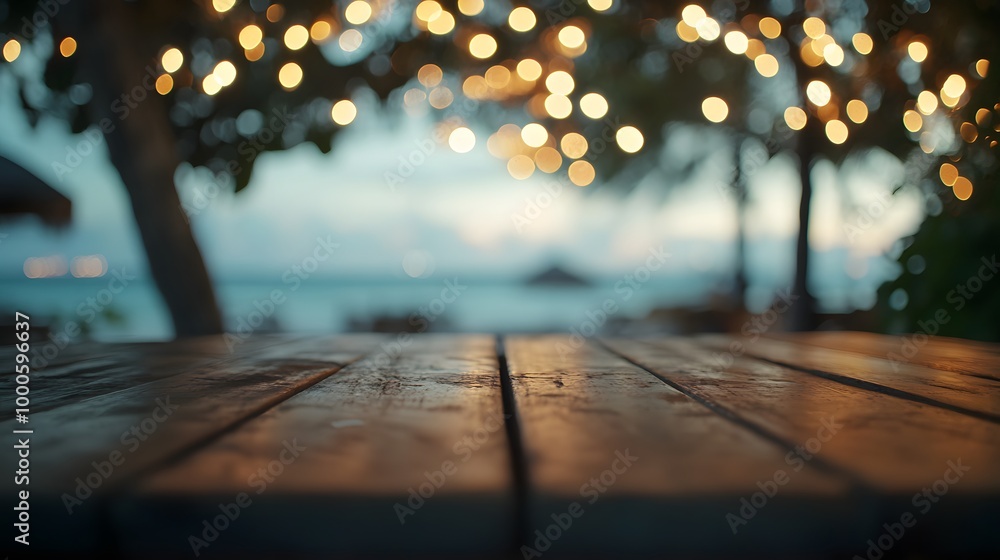 Aufkleber 1. a rustic wooden table set against a blurred beach cafe backdrop, adorned with bokeh lights twinkl