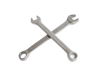 High angle view of crossed wrench combination wrench or spanner isolated on white background with clipping path.