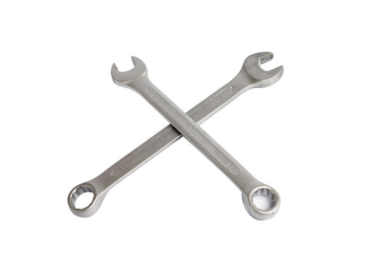 High angle view of crossed wrench combination wrench or spanner isolated on white background with clipping path.