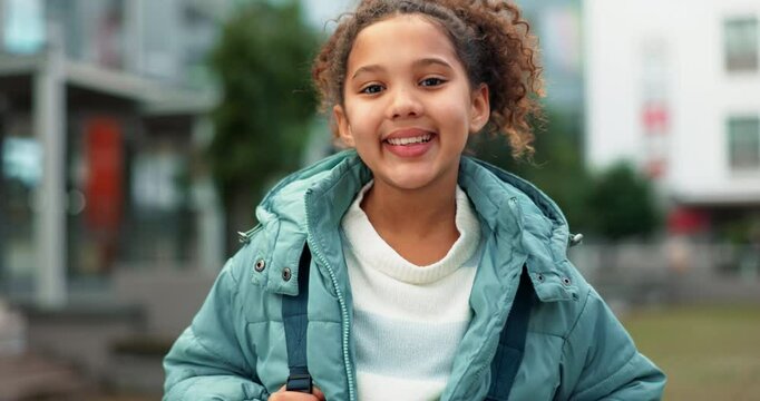 Outside, kid and girl with backpack or smile at school on portrait for education and learning in Brazil. Female person, learner and happy as student with confidence, joy and child development