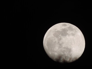 full moon over black