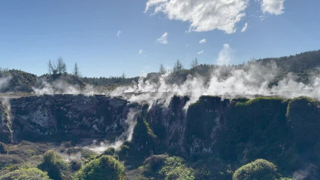 Beautiful geisers Northern Island New Zealand. Steam comes out of the ground. 