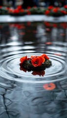 Memorial Wreath of Red Roses Floating on Reflective Water Surface in Serene Commemoration