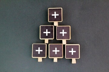stick with plus icon stacked up, addition or add more. Value added concept. An improvement or...