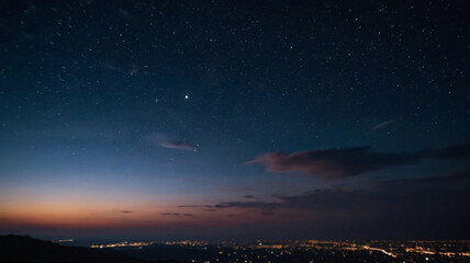 Obraz premium Panoramic clear night sky full of twinkling stars with blur night city background. Beautiful nature galaxy sky background.