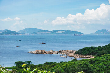 The beautiful seascape of the ocean and ferry transportation from Lamma island hiking trail from Sok Kwu Wan and Ling Kok Shan