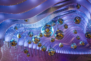 Festive background with silver and sparkling baubles