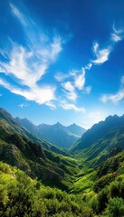 Stunning panoramic view of a mountain range, with towering peaks and deep valleys framed by a bright blue sky High contrast, wideangle shot, capturing the grandeur of nature
