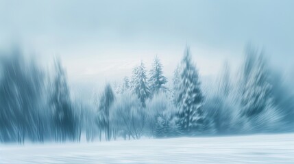 Serene winter scene with blurred snow-covered trees and distant mountains in blue