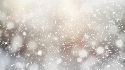 Obraz premium Winter scene with blurred snowflakes falling softly through a gray overcast sky