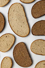 varios slices of bread on white background pattern