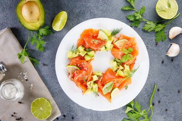 Salad with smoked salmon, avocado, and herbs. Ideal for healthy eating and fresh, gourmet meals