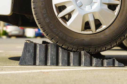 Camper using leveling block for level