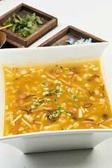 Hot and sour mushroom tofu beef bone marrow soup