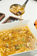 Hot and sour mushroom tofu beef bone marrow soup